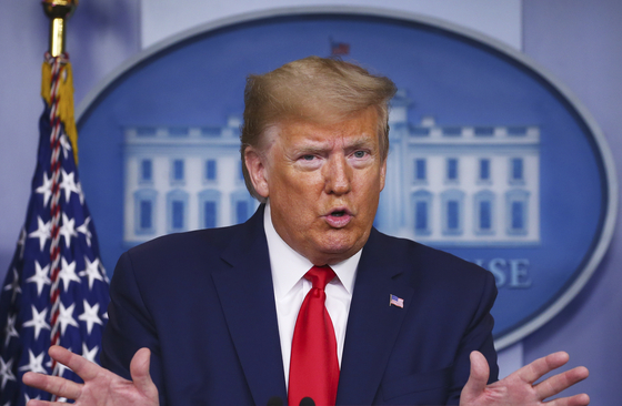 U.S. President Donald J. Trump delivers remarks on the Covid-19 pandemic during a press briefing at the White House last week. [YONHAP]