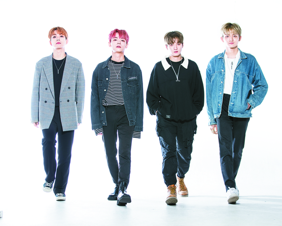 Four-member band Lucy released a debut single earlier this month. Lucy consists of, from left, vocalist Choi Sang-yeop, violinist and frontman Shin Ye-chan, drummer Shin Gwang-il and bassist and producer Cho Won-sang. [KWON HYUK-JAE]