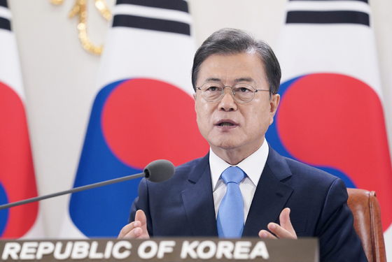 President Moon Jae-in gives a speech for the World Health Assembly's video session on Monday.  [YONHAP] 