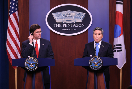 Korean Defense Minister Jeong Kyeong-doo, right, and U.S. Secretary of Defense Mark Esper hold a joint press conference in Washington in February. [YONHAP]