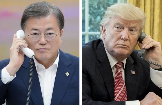 President Moon Jae-in talks on the phone with U.S. President Donald Trump on June 1 about Trump’s invitation of Korea to a G7 Summit in the United States in September. [YONHAP]
