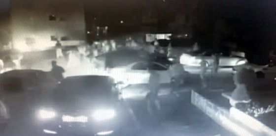 A CCTV image from a parking lot in Gimhae, South Gyeongsang, last Saturday night, released by police, shows some 30 people fighting. [YONHAP]