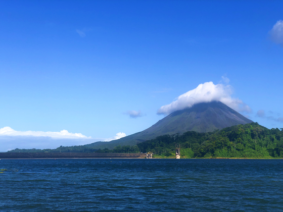 Costa Rica’s Arenal Volcano in mid-March, two weeks before the country banned all but essential travel. [JIM BULLEY]
