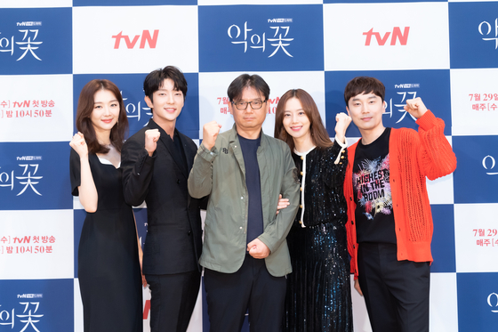 The cast of the upcoming tvN drama series "Flower of Evil" posing for a photo on Wednesday. The series is to start airing on July 29. [TVN] 