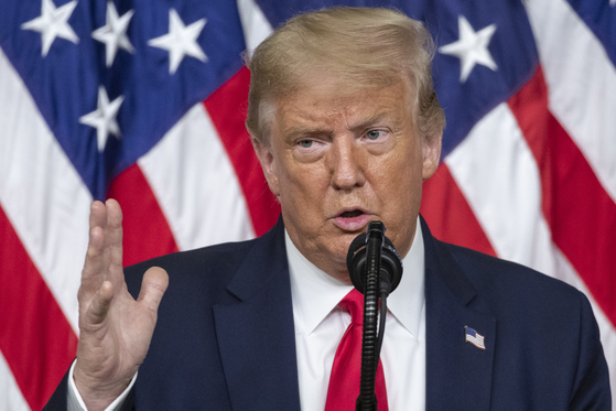 U.S. President Donald Trump speaks at the White House in Washington Friday. [AP/YONHAP]