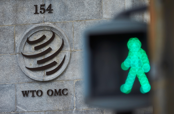A logo is pictured in front of the World Trade Organization (WTO) in Geneva, Switzerland. [REUTERS]