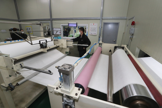 Filters used on face masks manufactured at a plant in Pocheon, Gyeonggi, in February, just before the huge spike in the number of confirmed cases in March. [YONHAP]