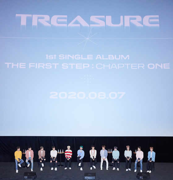 Boy band Treasure answers questions from the local press at its debut press conference held on Friday at the Yeongdeungpo CGV in southwestern Seoul. [YG ENTERTAINMENT]