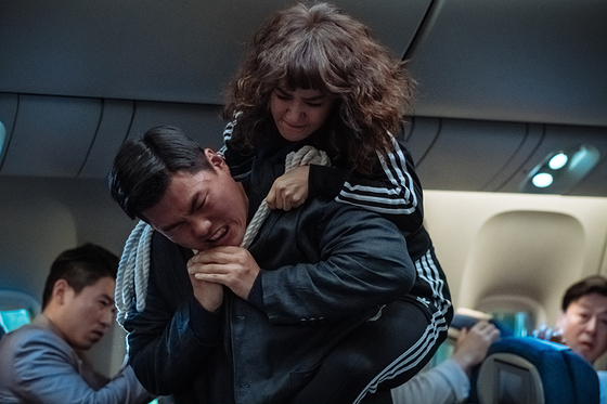 Uhm Jung-hwa as Mi-young, a once-elite North Korean agent who was living happily with her family until their plane gets hijacked by North Korean terrorists. [MEGABOX PLUS M] 