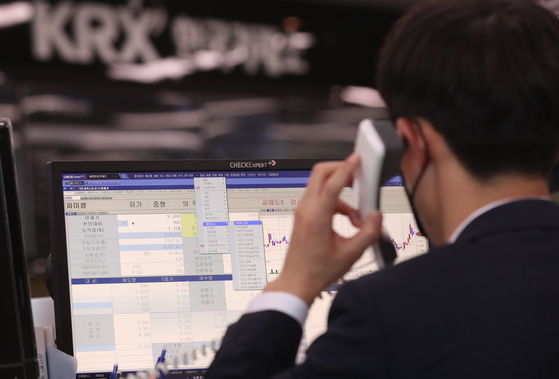 An employee works at the Korea Exchange's Busan branch. [NEWS1]