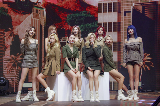 Girl group Twice performs during its first online concert ’Beyond LIVE ? Twice: World in A Day“ held on Sunday afternoon through Naver V Live. [JYP ENTERTAINMENT]
