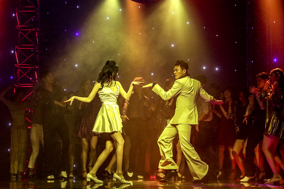 A captured image from Park Jin-young's collaboration with singer Sunmi "When We Disco." [JYP ENTERTAINMENT]