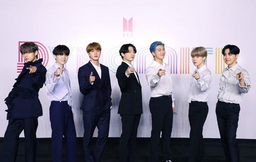 Boy band BTS poses for photos ahead of the online press conference held on Aug. 21 for its new digital single "Dynamite." [BIG HIT ENTERTAINMENT]