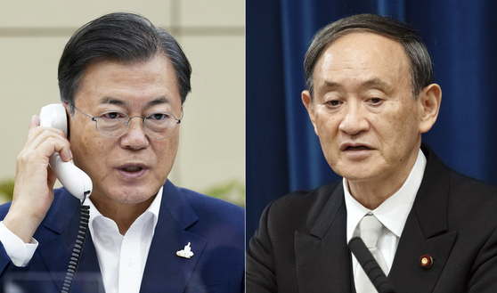 President Moon Jae-in, left, and Japanese Prime Minister Yoshihide Suga had their first phone conversation on Thursday. [YONHAP] 