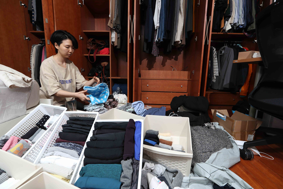 Park Seo-yu reorganizes her wardrobe as she spends more time at home with the outbreak of the coronavirus [KIM SANG-SEON] 