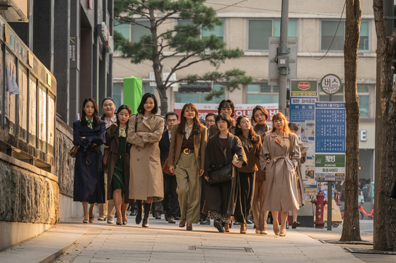 A scene from upcoming film "Samjin Company English Class" where the female protagonists resolve a case of massive corruption in their company. [LOTTE ENTERTAINMENT] 