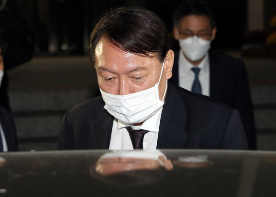 Prosecutor General Yoon Seok-youl leaves the National Assembly after a 15-hour audit of the Supreme Prosecutors' Office. [YONHAP]