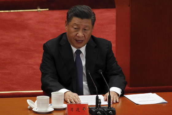 Chinese President Xi Jinping delivers a speech at a conference on the 70th anniversary of the Chinese army entering the Korean War at the Great Hall of the People in Beijing, Friday. [AP]