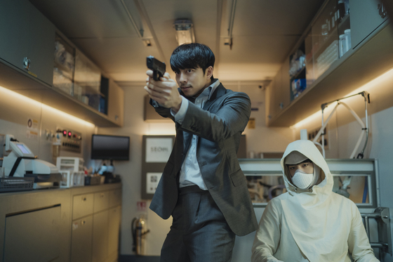 Gi-heon, played by Gong Yoo, is an ex-agent of the intelligence bureau on his last mission to transport Seobok, played by Park Bo-gum, the world's first-ever human clone, to safety. [CJ ENTERTAINMENT] 
