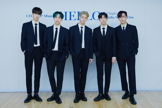 Boy band CIX poses for a photo during an online showcase held on Tuesday afternoon for its third EP "Hello Chapter 3. Hello, Strange Time." From left are members Hyunsuk, BX, Bae Jin-young, Yonghee and Seunghun. [C9 ENTERTAINMENT]