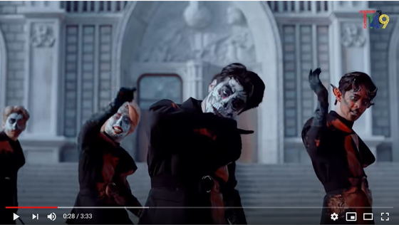 T1419 members wearing face paint in their "Dracula" music video. [SCREEN CAPTURE]