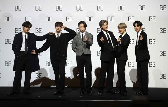  BTS is posing for the camera at a global press conference hosted at the Dongdaemun Design Plaza in central Seoul Friday to promote their fifth full album, ″BE (Deluxe Edition).″ [JOONGANG ILBO]
