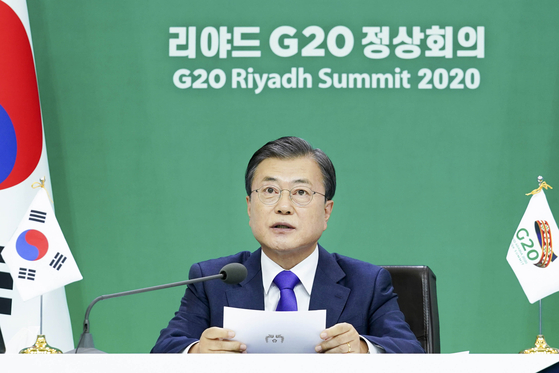 President Moon Jae-in speaks in a virtual meeting of the two-day Group of 20 summit which concluded Sunday. The G-20 leaders adopted a joint declaration calling for the affordable and equitable access of Covid-19 vaccines and therapeutics for all people. [JOINT PRESS CORPS]