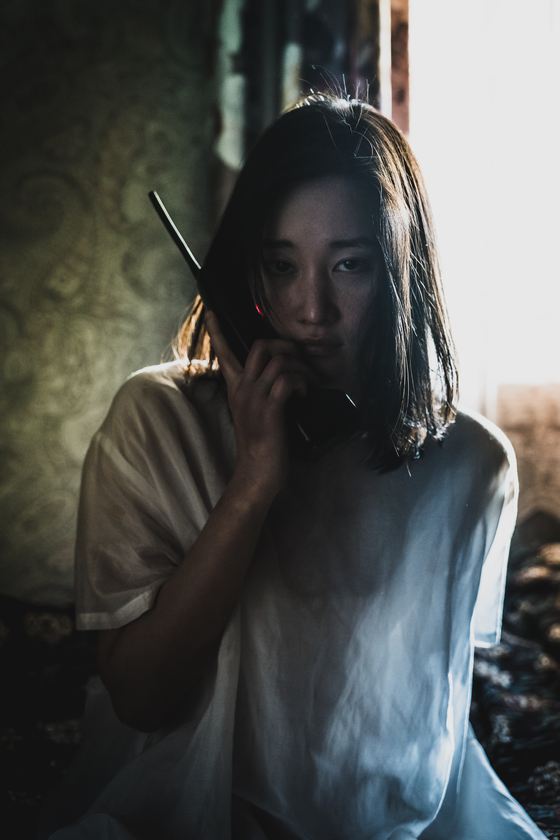 Young-sook (played by Jun Jong-seo) lived in the same house as Seo-yeon 20 years earlier. [NETFLIX]