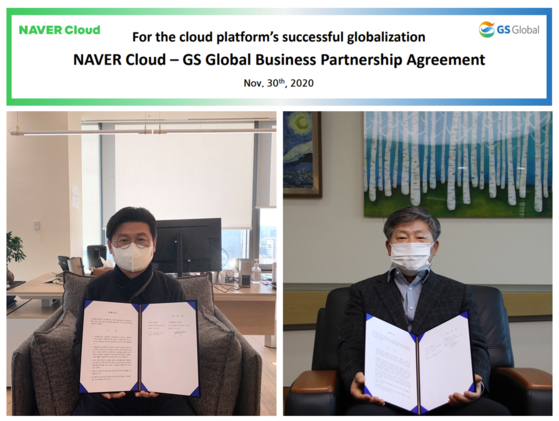 Naver Cloud CEO Park Weon-gi, left, and GS Global CEO Kim Tae-hyung pose during a ceremony to mark the start of the two companies' partnership on Sunday. [NAVER CLOUD]