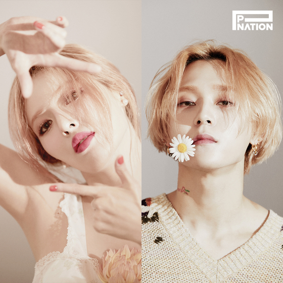 Singer HyunA, left, and rapper Dawn [P NATION]
