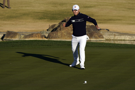 Kim Si-woo reacts after making a birdie putt on the 17th hole during the final round of The American Express tournament in La Quinta, California, on Sunday. [AP/YONHAP]