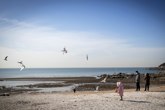 Incheon's Seonnyeo Rock Beach, which can be translated as fairy rock beach, is where singers Park Jin-young and Rain filmed scenes for their music video ″Switch to Me.″ [JANG JIN-YOUNG]