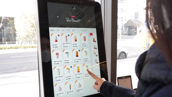 A CJ Olive Networks electronic kiosk in a Paul Bassett cafe. [CJ OLIVE NETWORKS]