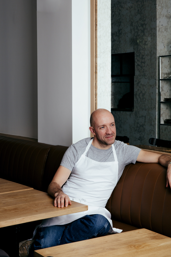 Chef Antonin Boneet of Michelin-starred restaurant Quinsou in Paris at his restaurant. He has decided to make Korean food to deliver to home diners during the times of the pandemic that kept many of the restaurants in Paris stayed closed. [VIRGINIE GARNIER]