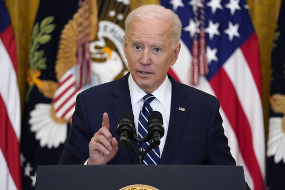 U.S. President Joe Biden warns that the United States will “respond accordingly” if North Korea chooses to escalate tensions in his first press conference since taking office in the East Room of the White House in Washington Thursday. [AP/YONHAP]
