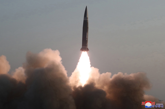 North Korea launches short-range ballistic missiles from Hamju County in South Hamkyong Province into the East Sea Thursday morning, as pictured in a photo released by the North's official Korean Central News Agency (KCNA) Friday. The KCNA said that North Korea successfully tested new tactical guided missiles. [YONHAP]