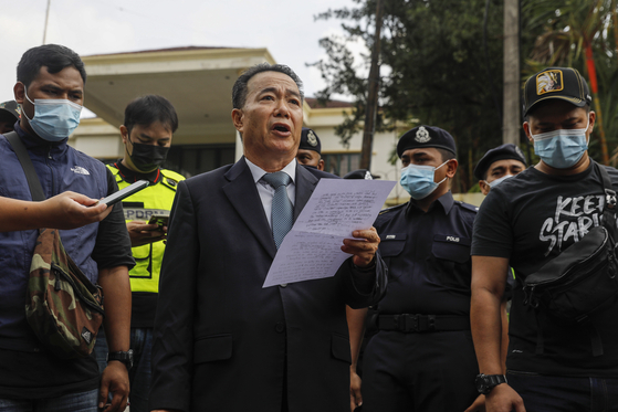 Kim Yu-song, charge d'affaires at the North Korean Embassy in Kuala Lumpur, speaks to journalists before departing Malaysia, Sunday. [EPA/YONHAP]