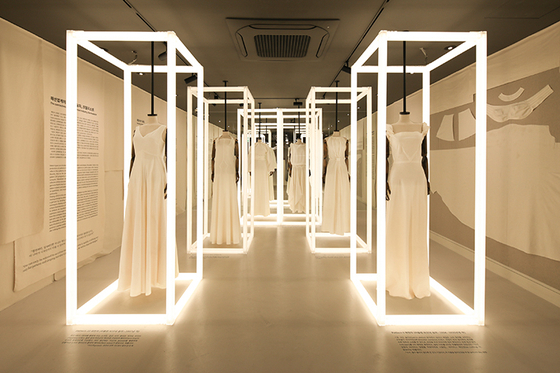 Cotton dresses by Seo on display at the Iumpium Sewing History Museum. [JANG JIN-YOUNG]