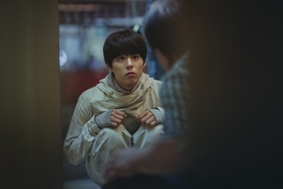 Actor Park Bo-gum as Seobok. Having spent his entire life in a lab, Seobok begins to question his purpose as he ventures outside to experience the world with Gi-heon. [CJ ENTERTAINMENT]
