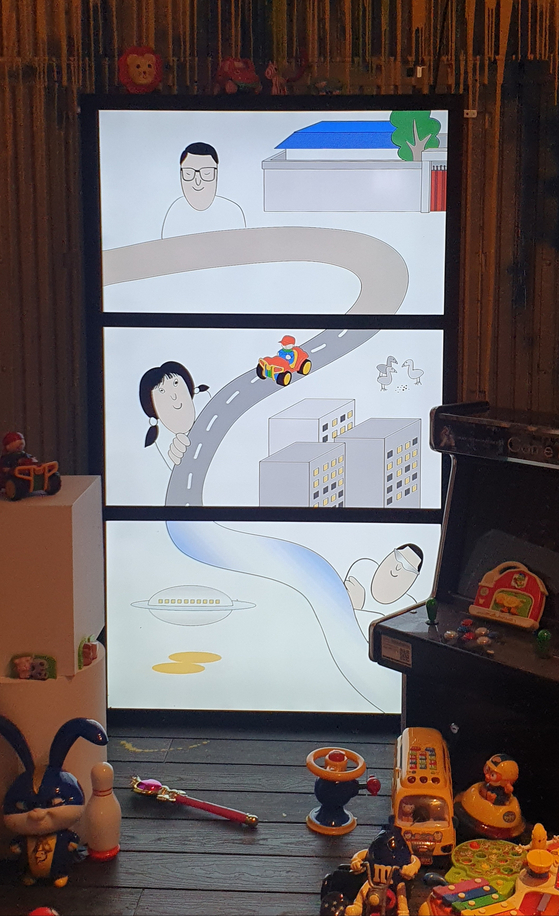 Illustrator Seotudio’s “Cycle” suggests passing down toys to the next generation rather than buying new ones in order to protect the environment. [HALEY YANG]