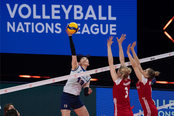 Park Jeong-ah plays the ball in a 2021 Women’s Volleyball Nations League match against Poland on Monday in Rimini, Italy. [FIVB]