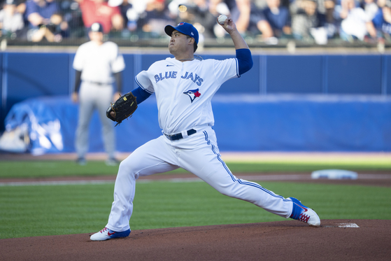 Toronto Blue Jays pitcher Ryu Hyun-jin delivers a pitch during the first inning against the New York Yankees at Sahlen Field in Buffalo, New York on Tuesday. [USA TODAY/YONHAP]