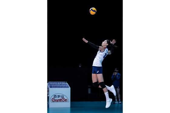 Kim Yeon-koung serves the ball at the Volleyball Nations League match against Turkey on Saturday in Rimini, Italy. [FIVB]
