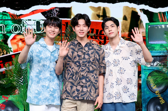 Even of Day, a subunit of rock band DAY6, poses for photos during an online showcase held on Monday for its second EP ″Right Through Me.″ [JYP ENTERTAINMENT]