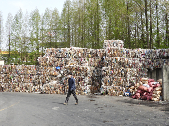 Plastic waste piled up in a recycling center in Gimpo. [KANG CHAN-SU]