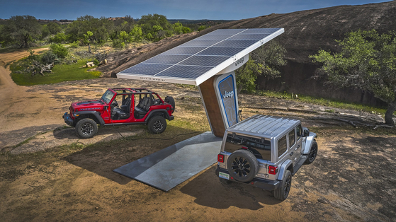 Two Jeep Wrangler 4xes are connected to a charger. The model is slated to launch in Korea in September at the earliest [STELLANTIS KOREA]