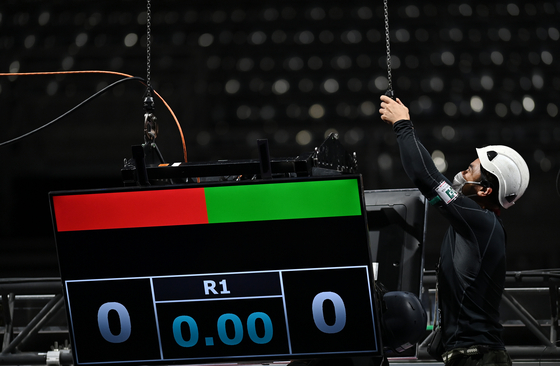 A staff member works at the Makuhari Messe Hall in Chiba, Japan where Olympic fencing events will take place ahead of the Tokyo 2020 Games on July 20. [XINHUA/YONHAP]