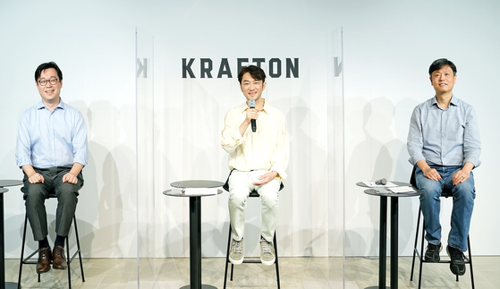 The three top managers of Krafton (from left) CFO Bae Dong-keun, CEO Kim Chang-han and Chairman Chag Byung-gyu sit down for an online press conference on Monday prior to the company's IPO scheduled for Aug. 10. [KRAFTON]