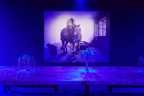 An area of the "Beyond the Road — Seoul 2021" exhibition features the album cover of British electronic band Unkle's album ″The Road: Part I.″ [BEYOND THE ROAD]