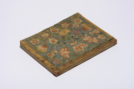 The embroidered silk cover of the Sutra of the Wise and the Foolish, a Buddhist scripture from the late Joseon period (1392-1910).  [SEOUL MUSEUM OF CRAFT ART]     